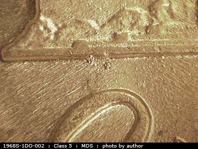 Die-stage B marker on 1968S•1DO•002 (1968 Doubled Die Obverse).