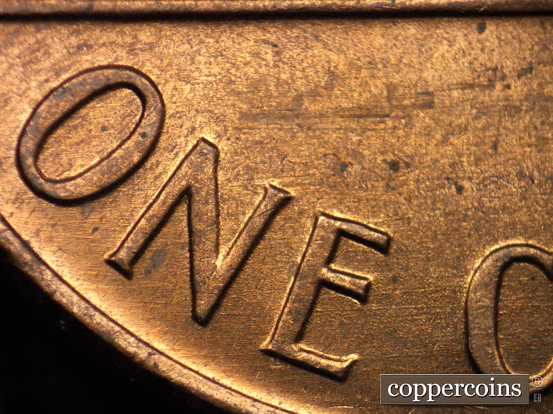 Die-stage B marker on 1968S•1DO•009 (1968 Doubled Die Obverse).