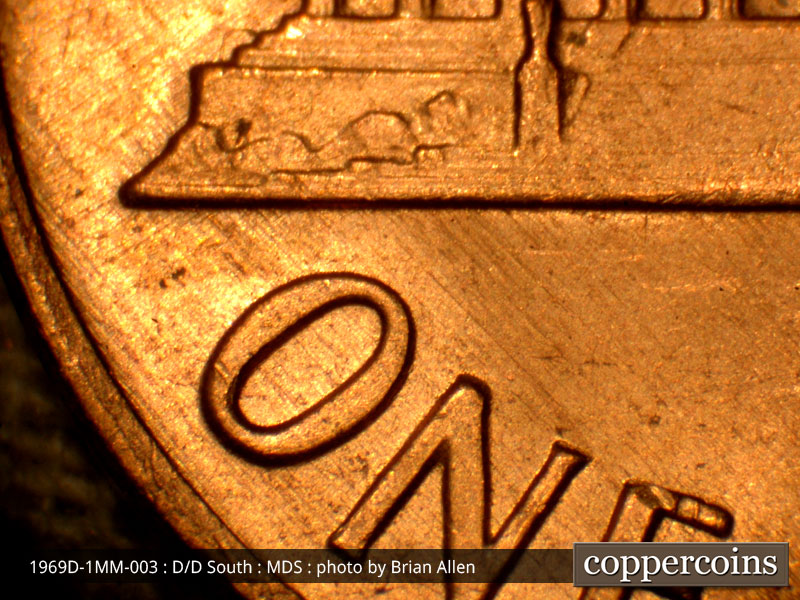 Die-stage B marker on 1969D•1MM•003 (1969 Repunched Mint Mark).