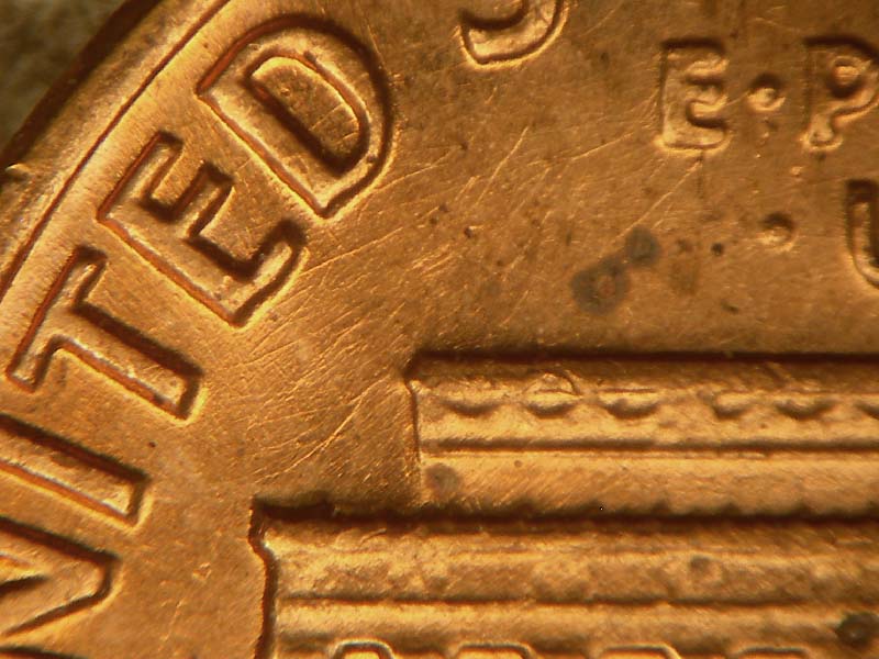 Die-stage B marker on 1969S•1DO•003 (1969 Doubled Die Obverse).