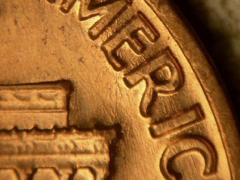 Die-stage B marker on 1969S•1DO•003 (1969 Doubled Die Obverse).