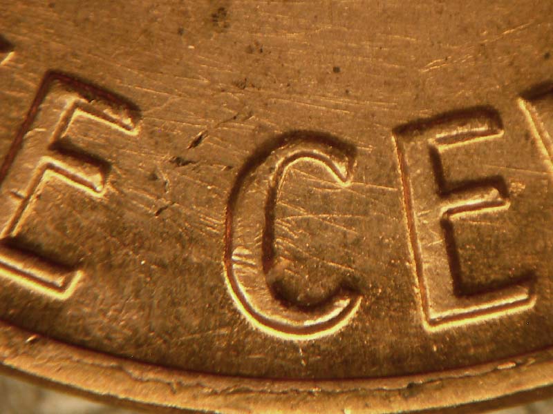 Die-stage B marker on 1969S•1DO•003 (1969 Doubled Die Obverse).
