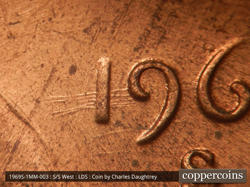 Die-stage C marker on 1969S•1MM•003 (1969 Repunched Mint Mark).