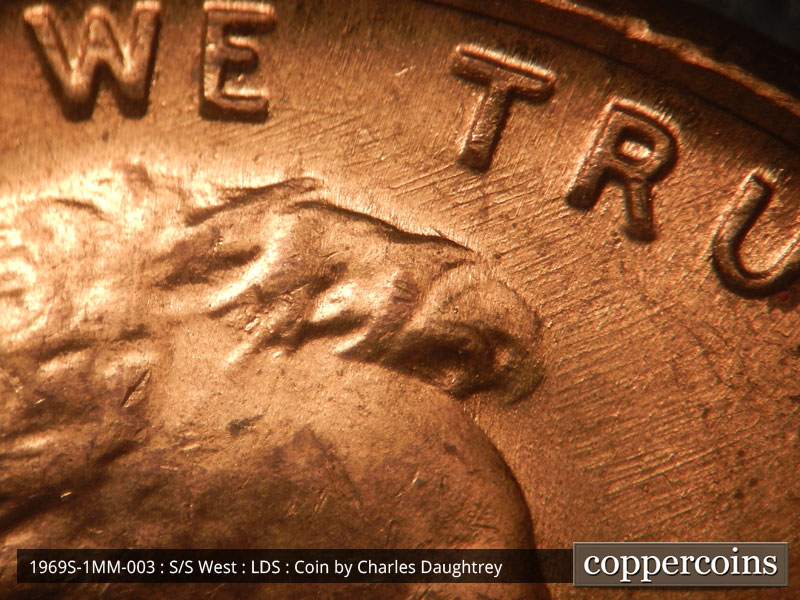 Die-stage C marker on 1969S•1MM•003 (1969 Repunched Mint Mark).