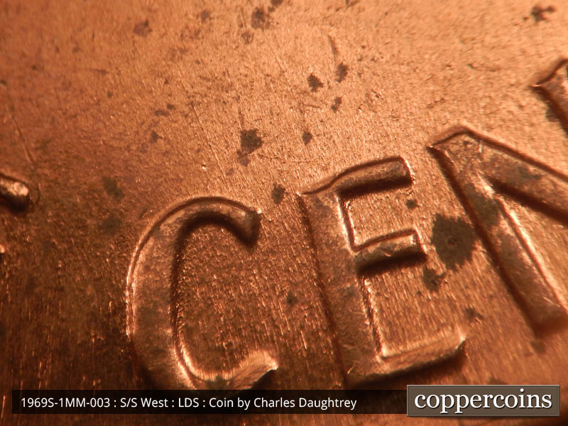 Die-stage C marker on 1969S•1MM•003 (1969 Repunched Mint Mark).