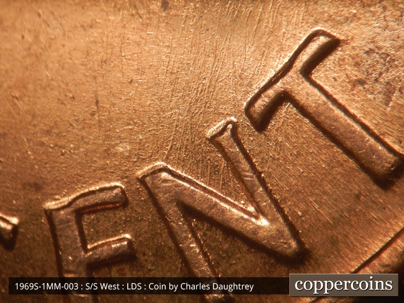 Die-stage C marker on 1969S•1MM•003 (1969 Repunched Mint Mark).