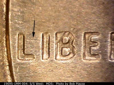 Die-stage B marker on 1969S•1MM•004 (1969 Repunched Mint Mark).