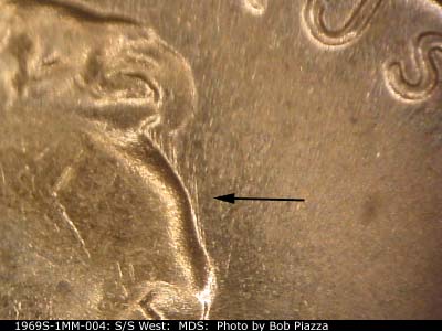 Die-stage B marker on 1969S•1MM•004 (1969 Repunched Mint Mark).
