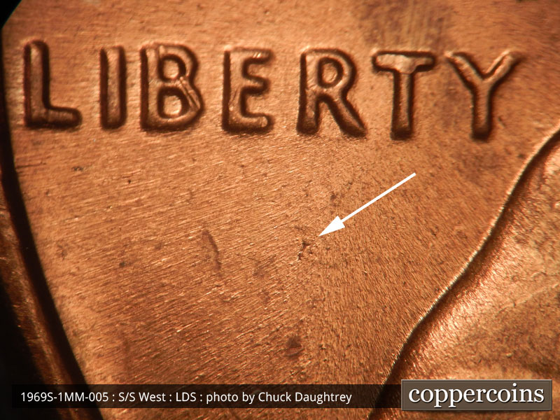 Die-stage C marker on 1969S•1MM•005 (1969 Repunched Mint Mark).