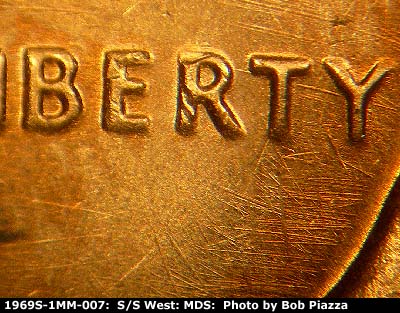 Die-stage B marker on 1969S•1MM•007 (1969 Repunched Mint Mark).