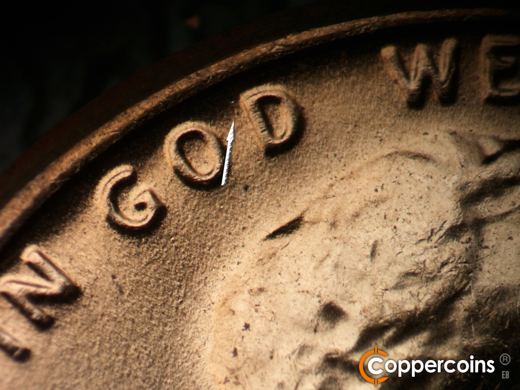 Die-stage C marker on 1970D•1DO•015 showing Die dot near D in GOD.