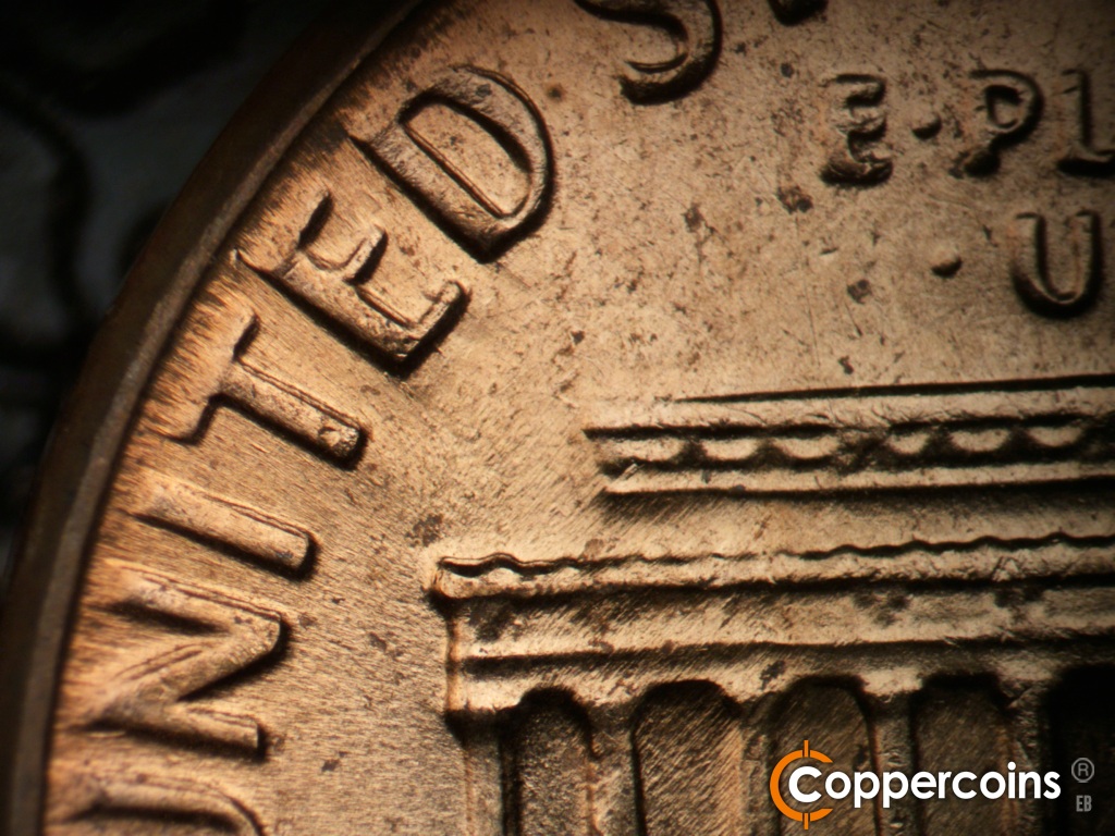 Die-stage C marker on 1970D•1DO•015 showing Heavy die wear on top of UNITED.