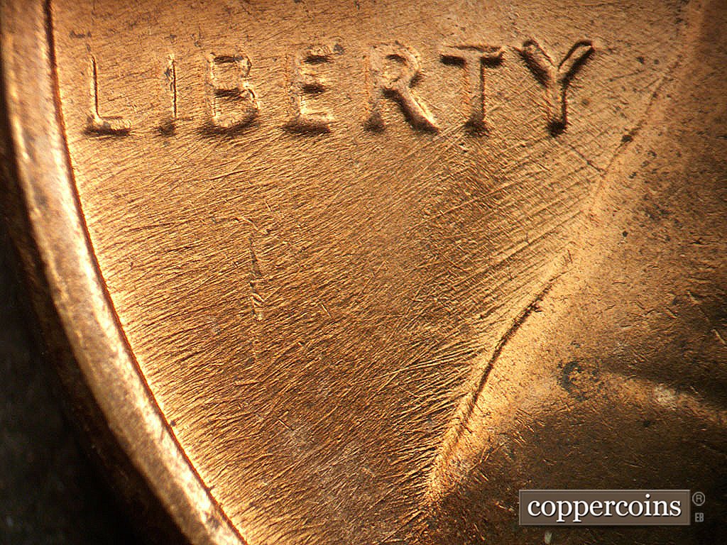 Die-stage B marker on 1971D•1MM•021 showing Die scratches through LIBERTY.