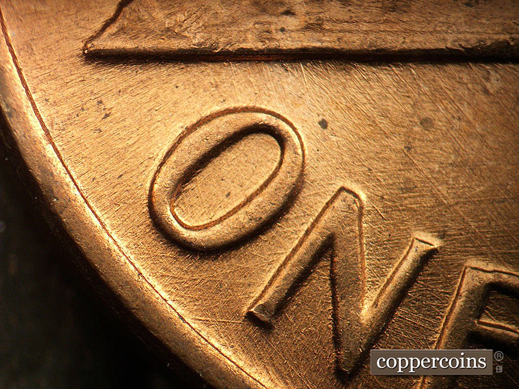 Die-stage B marker on 1971D•1MM•021 showing Die scratches through ON in ONE.
