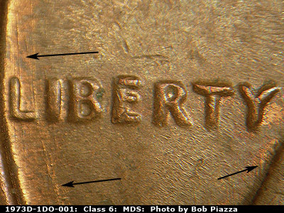 Die-stage B marker on 1973D•1DO•001 (1973 Doubled Die Obverse).