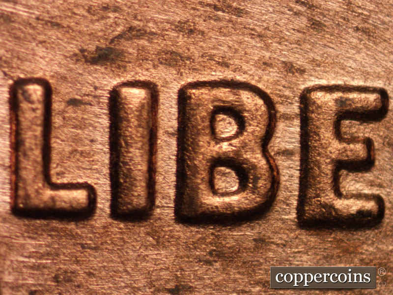 Die-stage B marker on 1974D•1MM•011 (1974 Repunched Mint Mark).