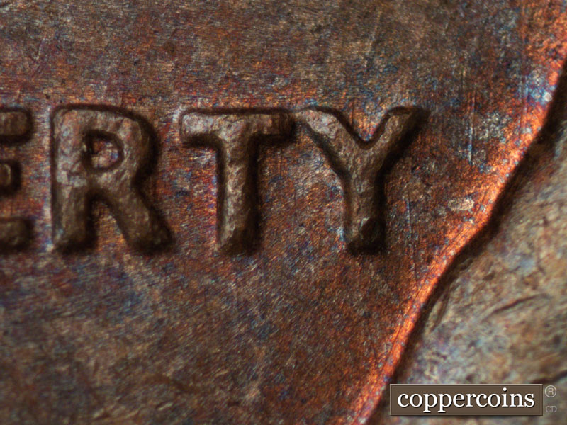 Die-stage B marker on 1974D•1MM•012 (1974 Repunched Mint Mark).