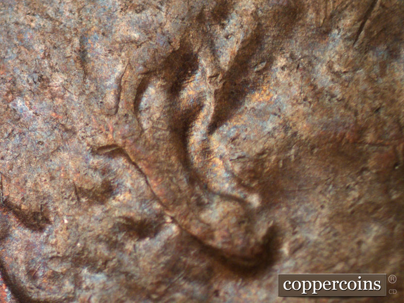 Die-stage B marker on 1974D•1MM•012 (1974 Repunched Mint Mark).