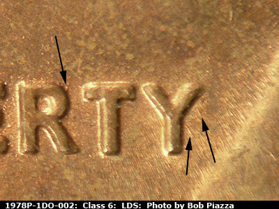 Die-stage C marker on 1978P•1DO•002 (1978 Doubled Die Obverse).