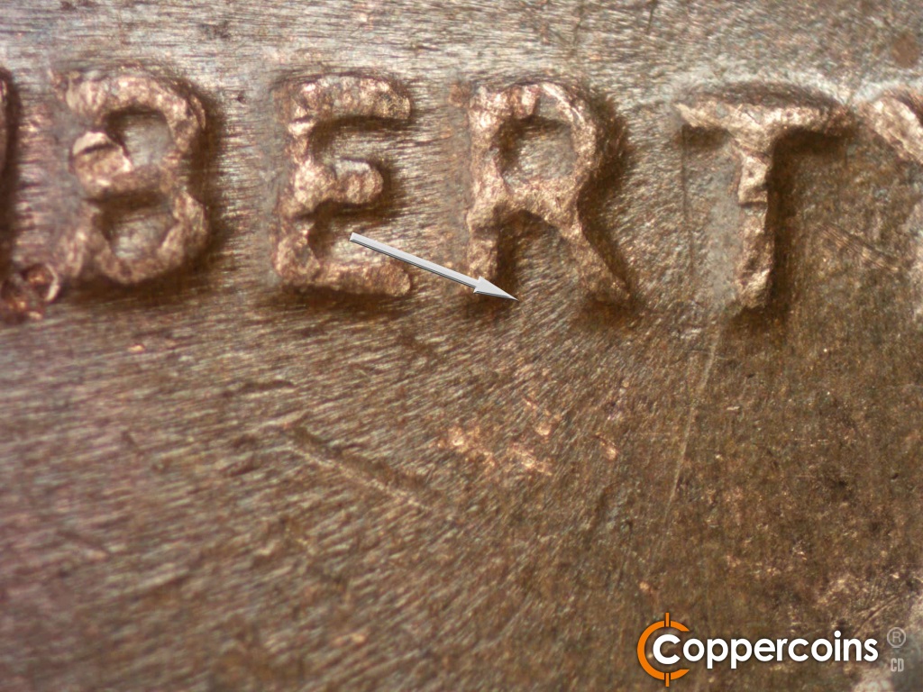 Die-stage B marker on 1981D•1MM•002 showing SSW die scratch from R in LIBERTY.
