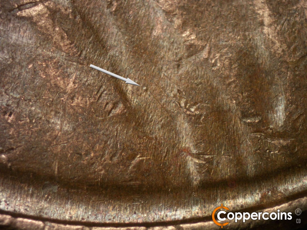 Die-stage B marker on 1981D•1MM•002 showing Die dot on jacket.