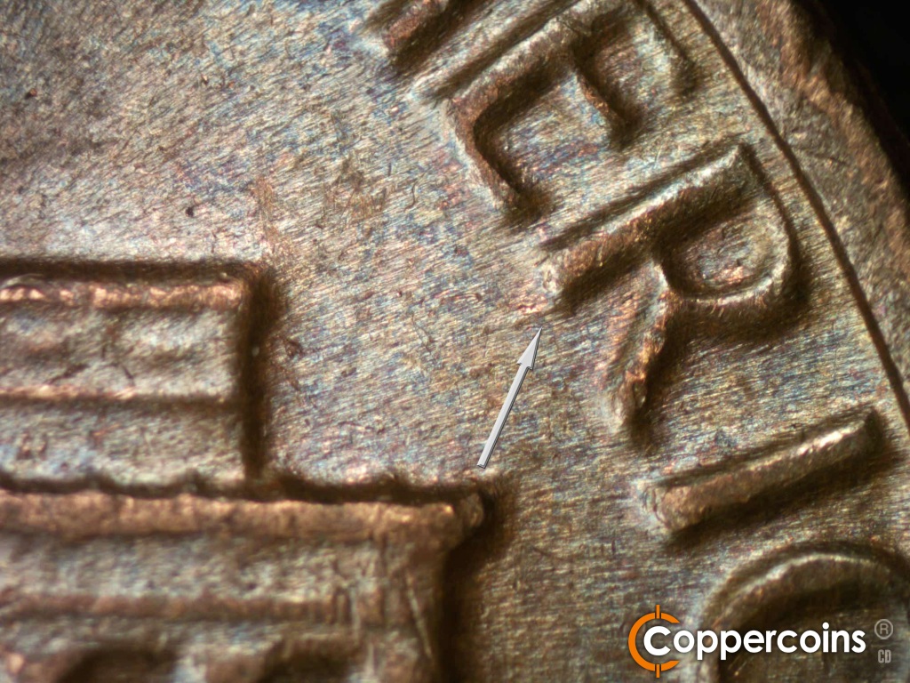 Die-stage B marker on 1981D•1MM•002 showing Die gouge from R in AMERICA.