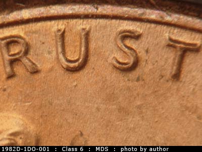 Die-stage B marker on 1982D•1DO•001 (1982 Doubled Die Obverse).