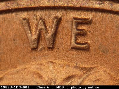 Die-stage B marker on 1982D•1DO•001 (1982 Doubled Die Obverse).