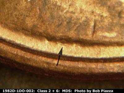 Die-stage B marker on 1982D•1DO•002 (1982 Doubled Die Obverse).