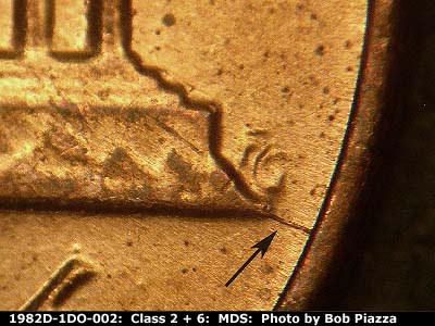 Die-stage B marker on 1982D•1DO•002 (1982 Doubled Die Obverse).