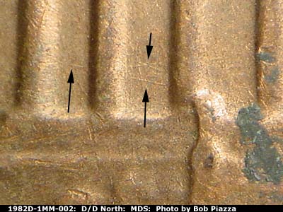 Die-stage B marker on 1982D•1MM•002 (1982 Repunched Mint Mark).