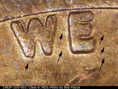 Die-stage B marker on 1982P•1DO•001 (1982 Doubled Die Obverse).