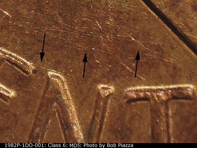 Die-stage B marker on 1982P•1DO•001 (1982 Doubled Die Obverse).
