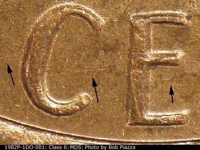 Die-stage B marker on 1982P•1DO•001 (1982 Doubled Die Obverse).