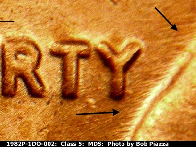 Die-stage B marker on 1982P•1DO•002 (1982 Doubled Die Obverse).