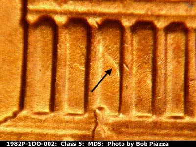 Die-stage B marker on 1982P•1DO•002 (1982 Doubled Die Obverse).