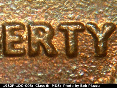 Die-stage B marker on 1982P•1DO•003 (1982 Doubled Die Obverse).