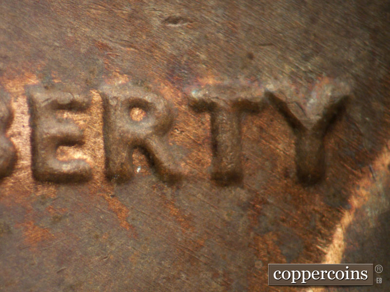 Die-stage B marker on 1982P•1DO•004 (1982 Doubled Die Obverse).