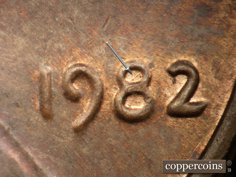 Die-stage B marker on 1982P•1DO•004 (1982 Doubled Die Obverse).