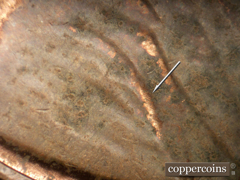 Die-stage B marker on 1982P•1DO•004 (1982 Doubled Die Obverse).