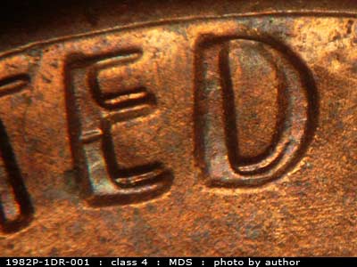 Die-stage B marker on 1982P•1DR•001 (1982 Doubled Die Reverse).