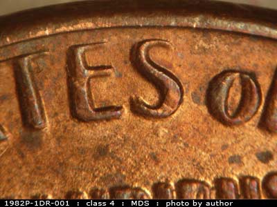 Die-stage B marker on 1982P•1DR•001 (1982 Doubled Die Reverse).