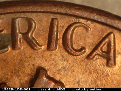Die-stage B marker on 1982P•1DR•001 (1982 Doubled Die Reverse).