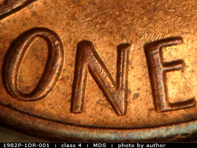 Die-stage B marker on 1982P•1DR•001 (1982 Doubled Die Reverse).