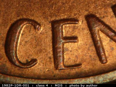 Die-stage B marker on 1982P•1DR•001 (1982 Doubled Die Reverse).