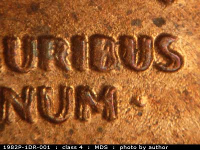 Die-stage B marker on 1982P•1DR•001 (1982 Doubled Die Reverse).