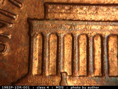 Die-stage B marker on 1982P•1DR•001 (1982 Doubled Die Reverse).