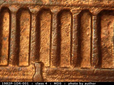 Die-stage B marker on 1982P•1DR•001 (1982 Doubled Die Reverse).