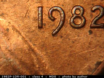 Die-stage B marker on 1982P•1DR•001 (1982 Doubled Die Reverse).