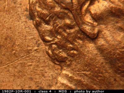 Die-stage B marker on 1982P•1DR•001 (1982 Doubled Die Reverse).